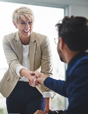 Woman and Man shaking hands